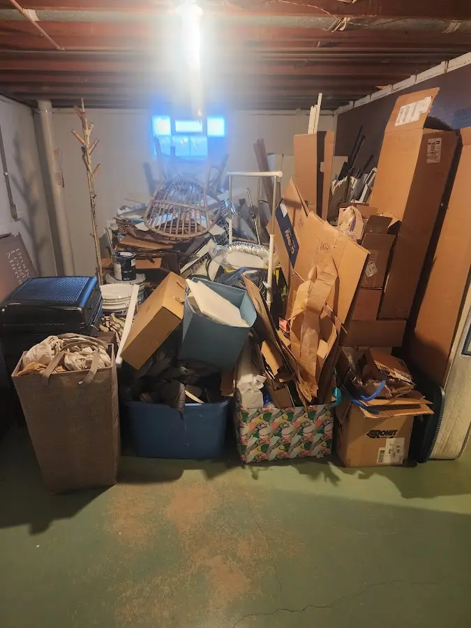 Roll-off dumpster container at job site for 8 Yard Dumpster Rental in Holts Summit